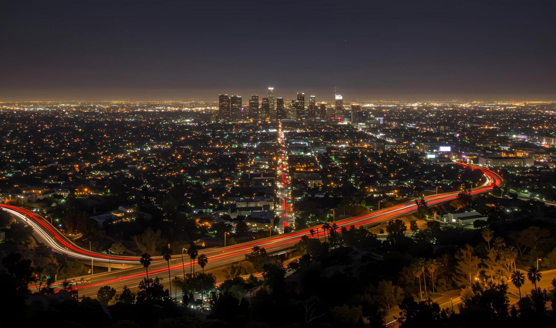 Vibrant Los Angeles Nightscape: City Lights, Urban Skyline, and Iconic Landmarks Under Starry Sky