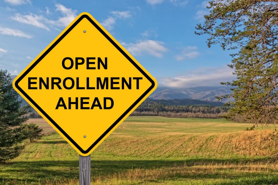 Open Enrollment Highway Sign in front of farmland