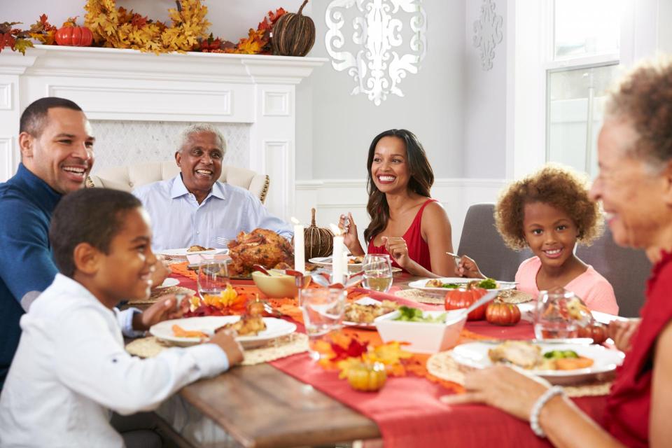 Family enjoying Thanksgiving Dinner