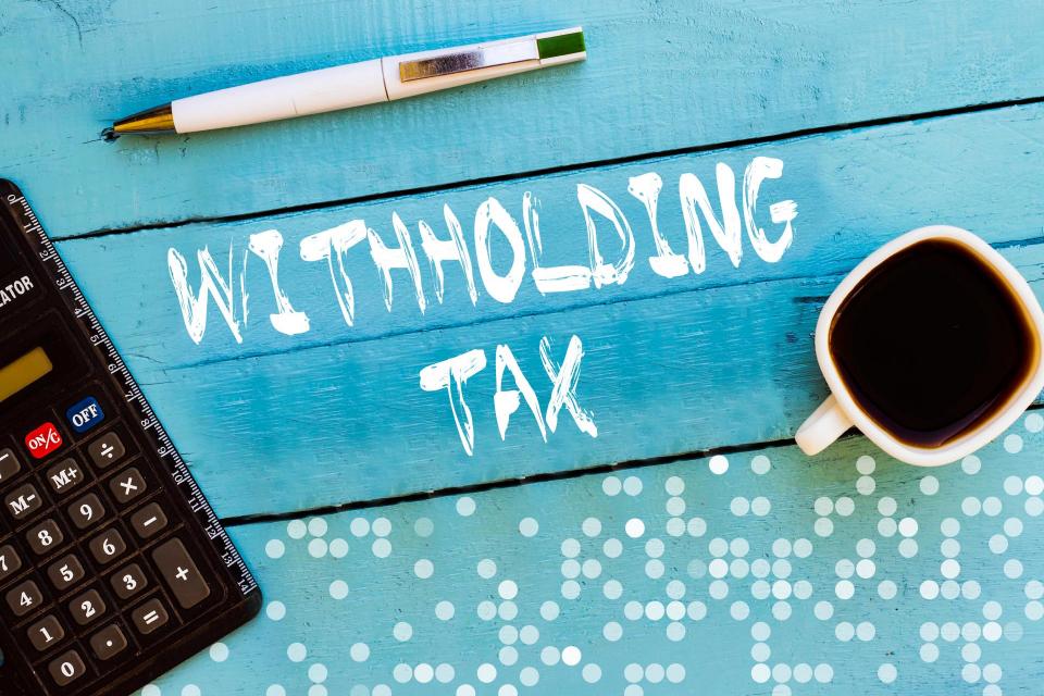 Withholding tax in blue table.