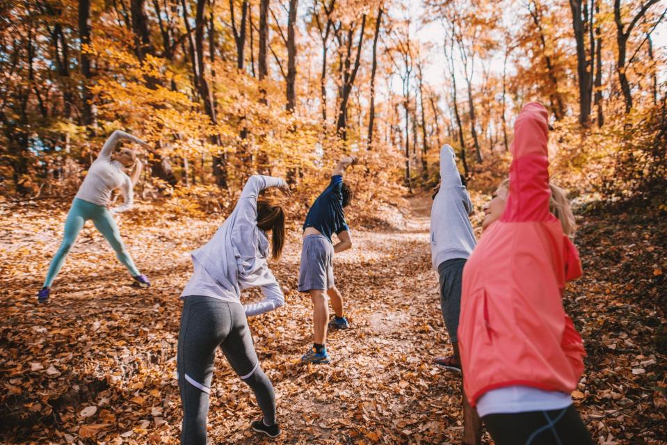 People exercising in Fall.
