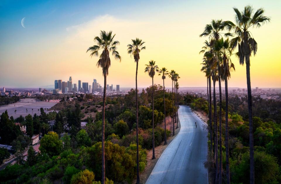 Roadway leading to downtown Los Angeles at sunset